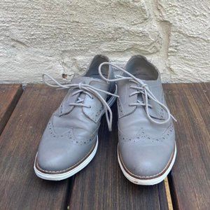 Grey sneakers with western detailing